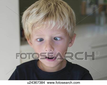Picture - Boy 7 pulling silly face. Fotosearch