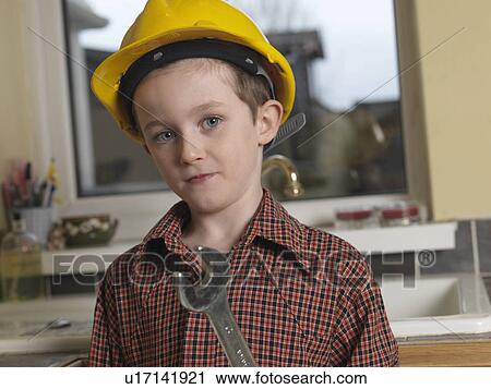 Boy dressed as builder View Large Photo Image Stock Image - Boy dressed as builder. Fotosearch