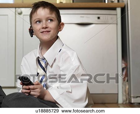 Boy dressed as business man View Large Photo Image Stock Photo - Boy dressed as business man. Fotosearch