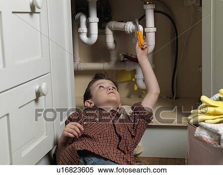 Boy dressed as repair man View Large Photo Image Stock Photography - Boy dressed as repair man. Fotosearch