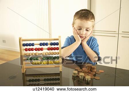 boy looking at money View Large Photo Image Stock Image - boy looking at money. Fotosearch