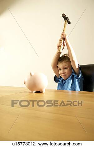 boy smashing piggy bank View Large Photo Image Stock Image - boy smashing piggy bank. Fotosearch