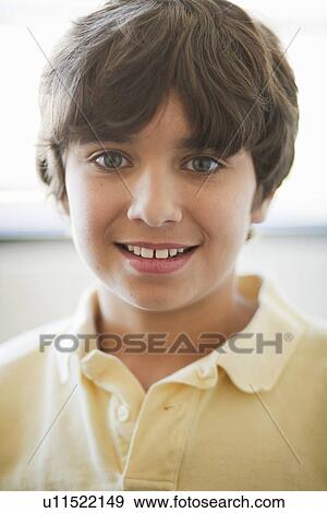 Boy smiling, close up View Large Photo Image Stock Photo - Boy smiling, close up. Fotosearch