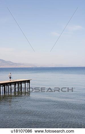 Boy With Dip Net On Pier View Large Photo Image Stock Photograph - Boy With Dip Net On Pier. Fotosearch