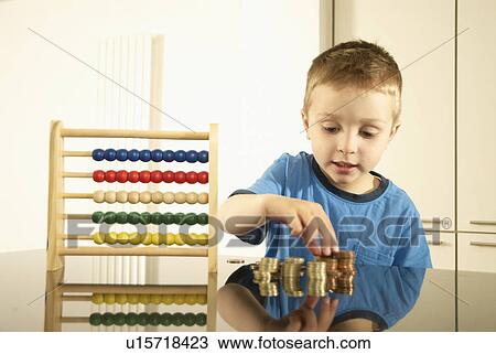 boy with money and abacus View Large Photo Image Stock Image - boy with money and abacus. Fotosearch