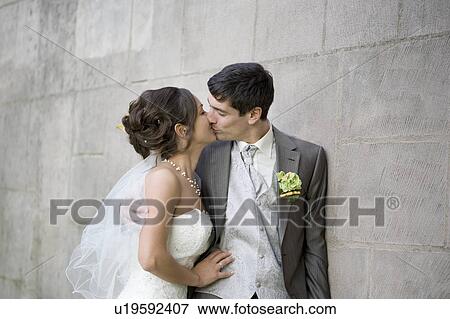 Bridal couple kissing. View Large Photo Image Stock Photo - Bridal couple kissing.. Fotosearch