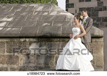 Bridal couple looking to one direction. View Large Photo Image Stock Image - Bridal couple looking to one direction.. Fotosearch