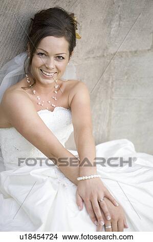 Bride smiling at the camera. View Large Photo Image Picture - Bride smiling at the camera.. Fotosearch