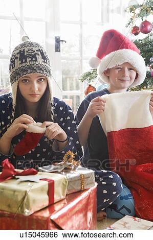 Brother and sister with stockings View Large Photo Image Stock Photograph - Brother and sister with stockings. Fotosearch