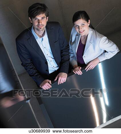 Businesswoman and businessman, Portrait View Large Photo Image Stock Photo - Businesswoman and businessman, Portrait. Fotosearch
