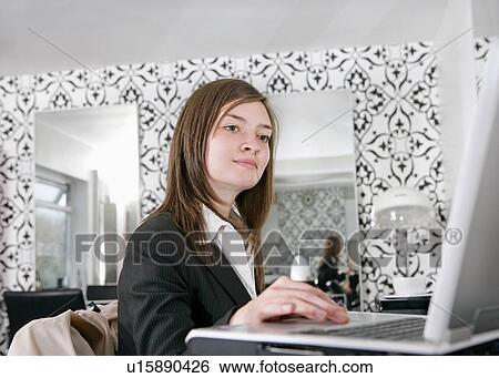 Businesswoman with laptop View Large Photo Image Stock Photograph - Businesswoman with laptop. Fotosearch