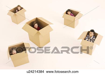 Picture - children sitting in boxes. Fotosearch