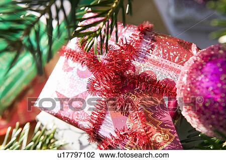 Stock Image - Christmas presents under tree. Fotosearch
