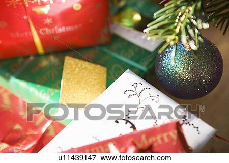 Christmas presents under tree View Large Photo Image Stock Photo - Christmas presents under tree. Fotosearch