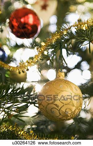 Christmas tree decorations View Large Photo Image Stock Photograph - Christmas tree decorations. Fotosearch