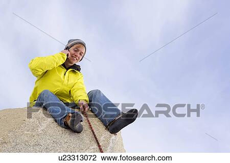 Climber belaying fellow climber View Large Photo Image Stock Image - Climber belaying fellow climber. Fotosearch