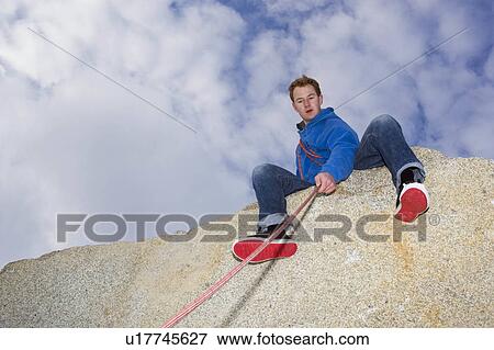 climber belaying on snow covered peak View Large Photo Image Stock Photo - climber belaying on snow covered peak. Fotosearch