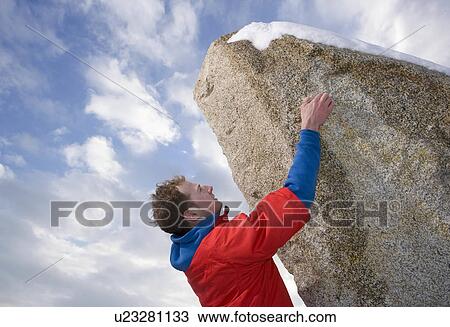 climber free climbing snow capped peak View Large Photo Image Stock Image - climber free climbing snow capped peak. Fotosearch