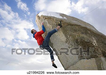 climber free climbing snow capped peak View Large Photo Image Stock Photograph - climber free climbing snow capped peak. Fotosearch