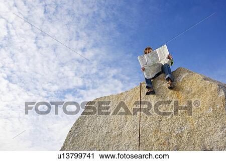 Climber looking at map View Large Photo Image Stock Image - Climber looking at map. Fotosearch