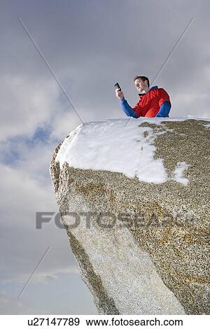 climber taking picture on mountain peak View Large Photo Image Stock Photo - climber taking picture on mountain peak. Fotosearch