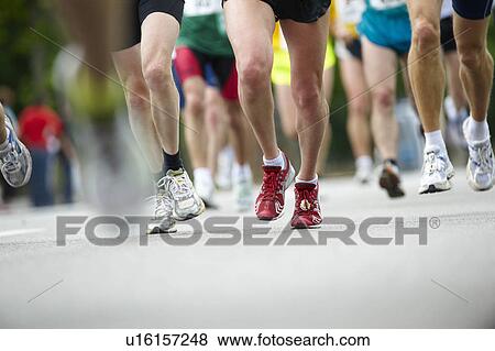 Close up of running feet View Large Photo Image Stock Photo - Close up of running feet. Fotosearch