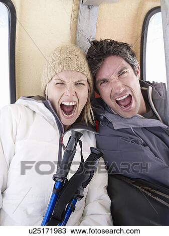 couple screaming at viewer View Large Photo Image Stock Image - couple screaming at viewer. Fotosearch