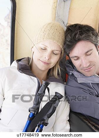 Stock Photo - couple sleeping head to head. Fotosearch