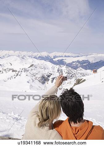 couple taking picture of themselves View Large Photo Image Stock Photo - couple taking picture of themselves. Fotosearch