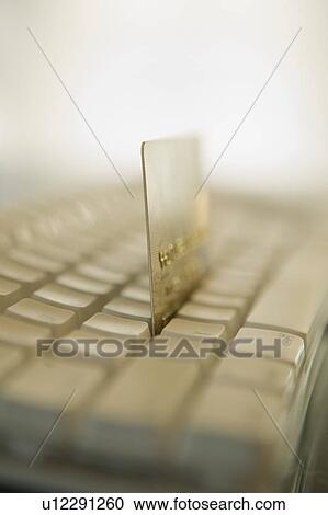 Credit card on computer keyboard View Large Photo Image Stock Image - Credit card on computer keyboard. Fotosearch