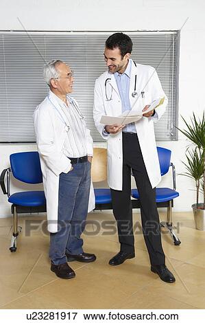 Stock Photo - Doctors in waiting room. Fotosearch