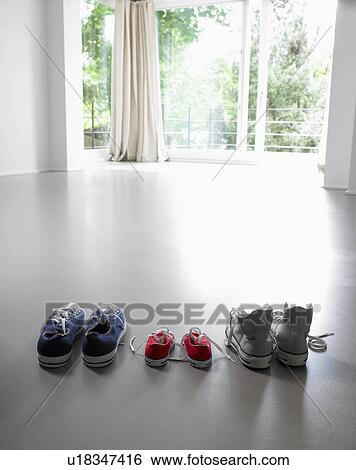 Stock Photograph - Family's shoes. Fotosearch