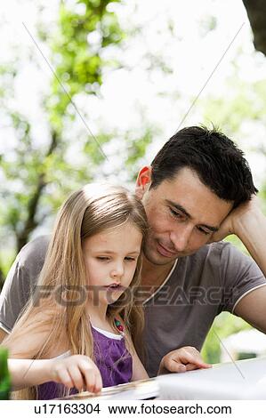 Father And Daughter Learning View Large Photo Image Picture - Father And Daughter Learning. Fotosearch