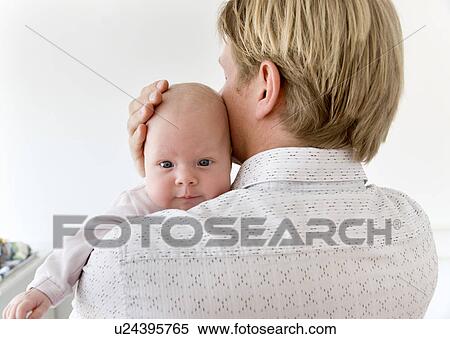 father carrying baby on shoulder View Large Photo Image Stock Photography - father carrying baby on shoulder. Fotosearch