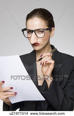Picture - Female as business woman with fake nose. Fotosearch
