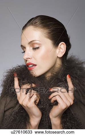 Female beauty model in fur coat with eye View Large Photo Image Stock Image - Female beauty model in fur coat with eye. Fotosearch