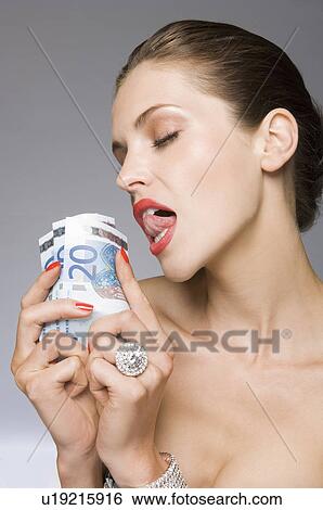 Female beauty model loving money View Large Photo Image Stock Photograph - Female beauty model loving money. Fotosearch