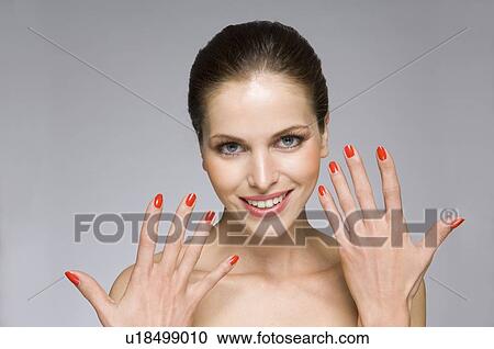 Stock Image - Female beauty model with hands. Fotosearch