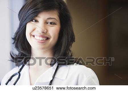 Female Doctor smiling View Large Photo Image Stock Image - Female Doctor smiling. Fotosearch