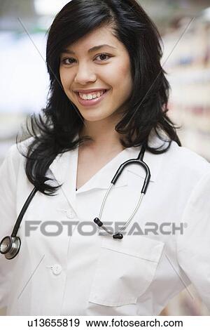 Stock Photo - Female Doctor smiling. Fotosearch