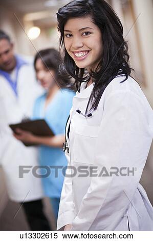 Female Doctor smiling View Large Photo Image Stock Photography - Female Doctor smiling. Fotosearch