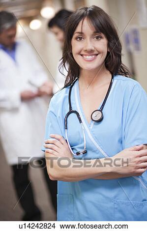 Female nurse smiling View Large Photo Image Picture - Female nurse smiling. Fotosearch