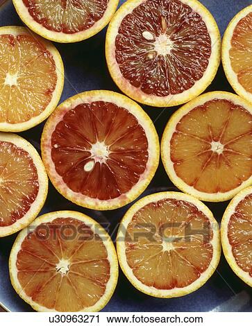Food - Blood oranges cut in half View Large Photo Image Stock Image - Food - Blood oranges cut in half. Fotosearch