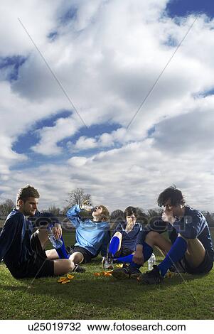 footballers having refreshments View Large Photo Image Stock Image - footballers having refreshments. Fotosearch