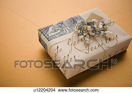 Gift to celebrate a trip View Large Photo Image Picture - Gift to celebrate a trip. Fotosearch