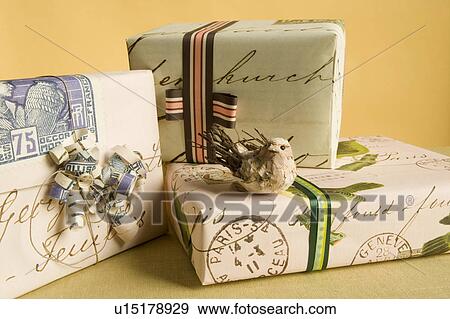 Gifts stacked up at a party View Large Photo Image Stock Photo - Gifts stacked up at a party. Fotosearch