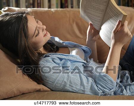 Girl, 14 reading View Large Photo Image Stock Image - Girl, 14 reading. Fotosearch
