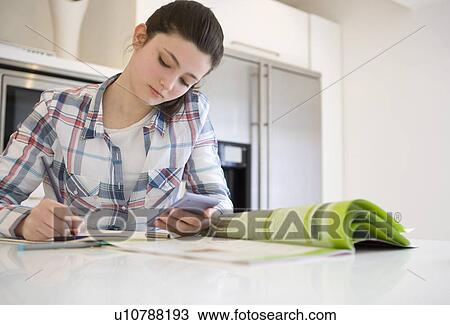 Girl 14, studying at home View Large Photo Image Stock Image - Girl 14, studying at home. Fotosearch