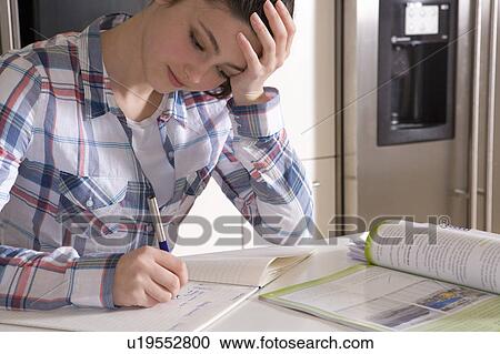 Girl 14, studying at home View Large Photo Image Stock Image - Girl 14, studying at home. Fotosearch