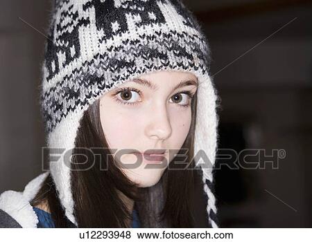 Stock Photo - Girl, 14 wearing hat. Fotosearch